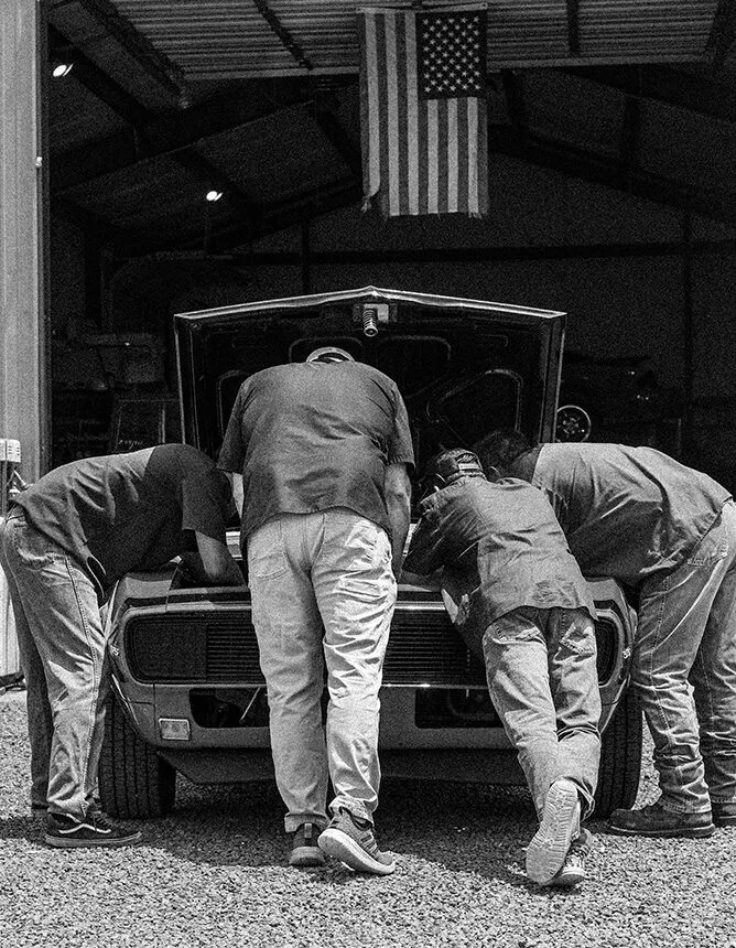 Speed Nuts Classics team working on classic cars